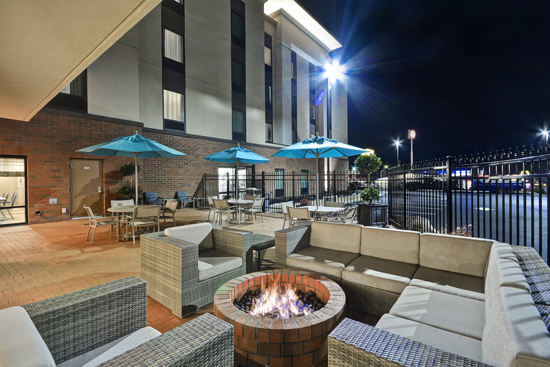 patio area with firepit outside of hotel