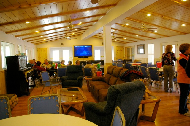 community room with chairs and sofas