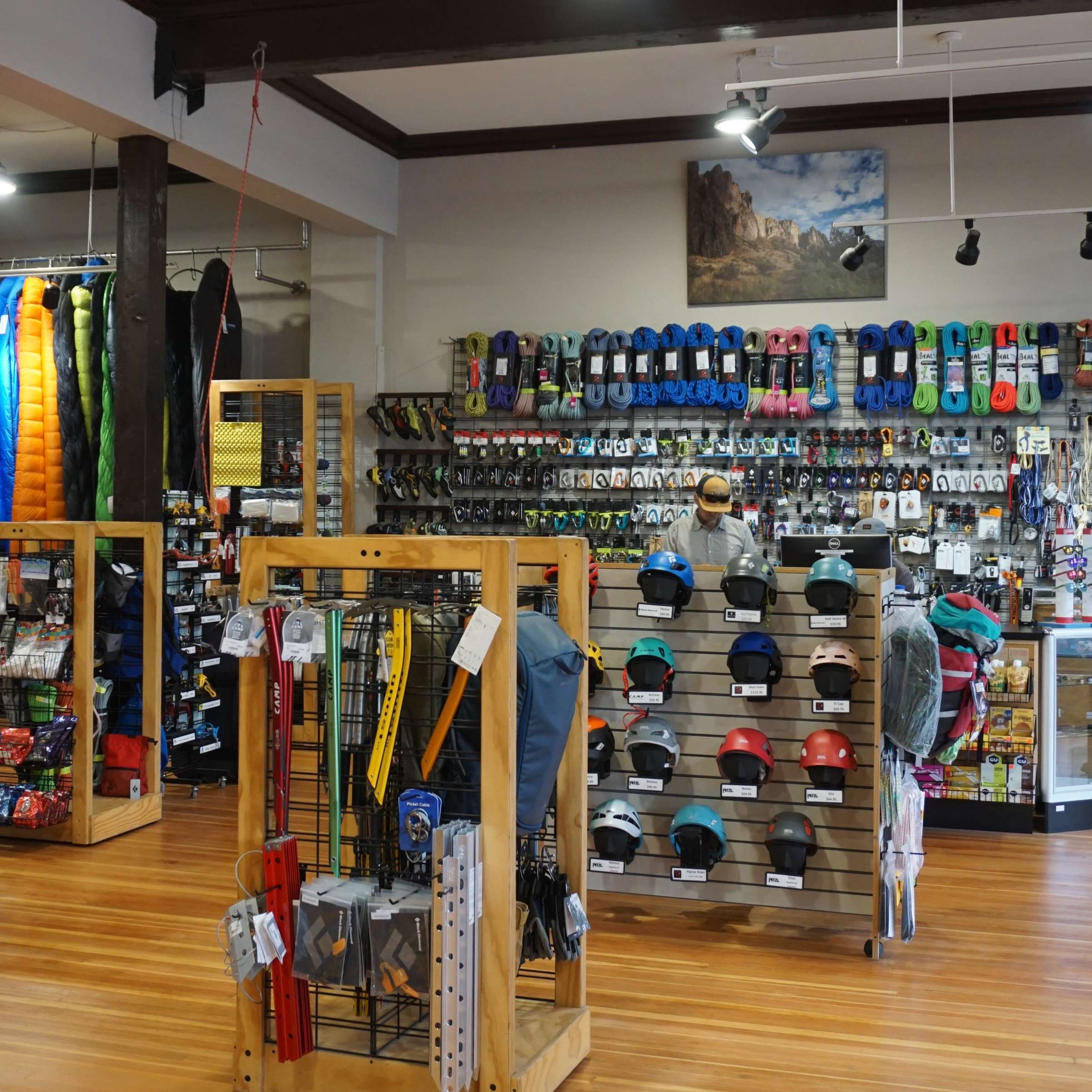 Interior view of shop with outdoor recreation gear featured.