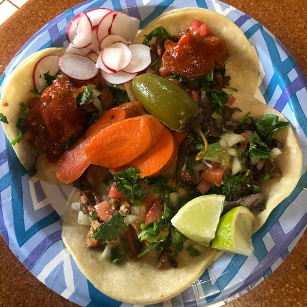 Plate full of street tacos