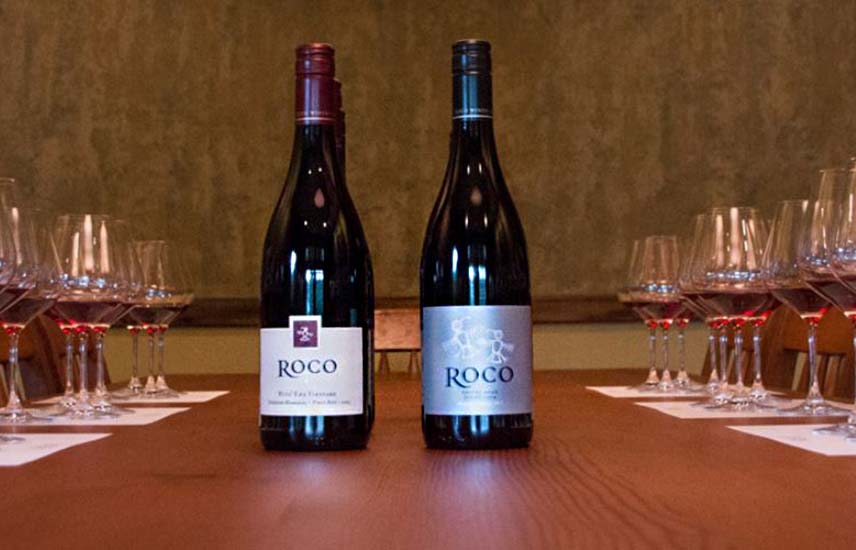 two bottles of wine with ROCO on the labels