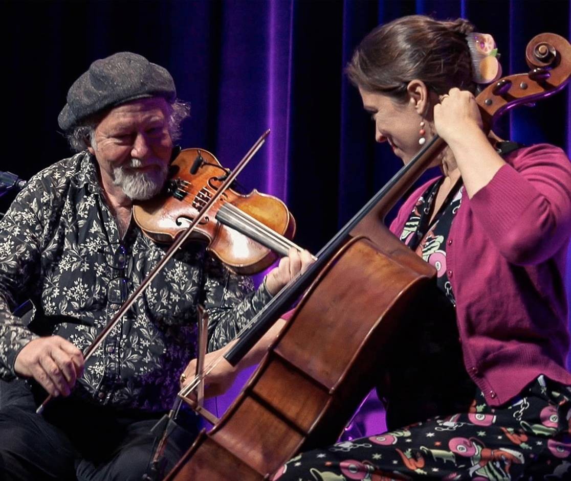 Alasdair Fraser and Natalie Haas perform on stage
