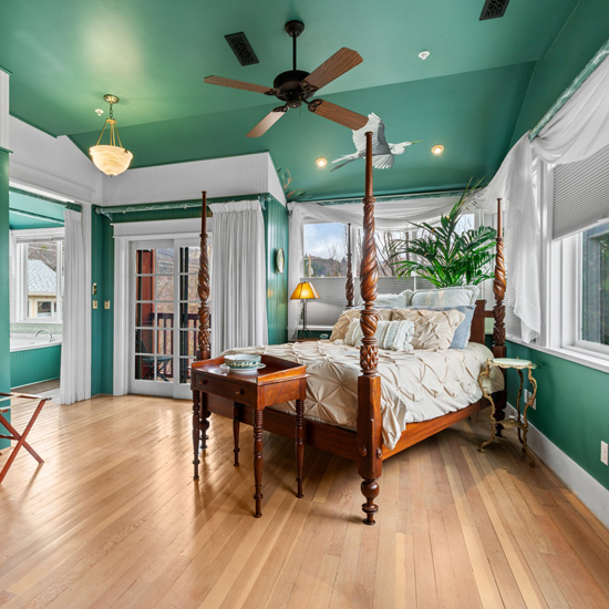 guest room with four poster bed