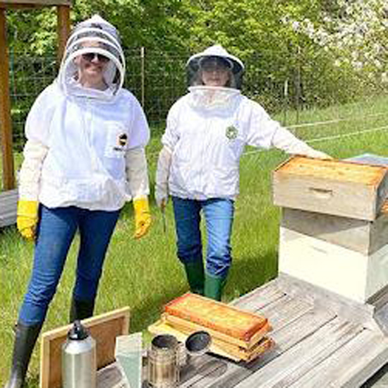 two beekeepers