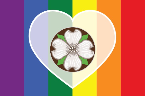 A graphic featuring a heart shape outlined in white centered over vertical rainbow stripes in purple, blue, green, yellow, orange, and red.