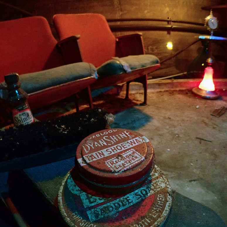 antique theater seats and od tin containers for shoe wax and saddle soap