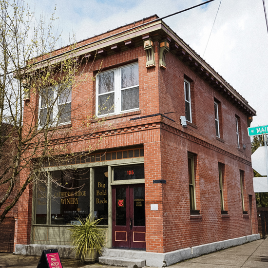 exterior of two  story brick retail building