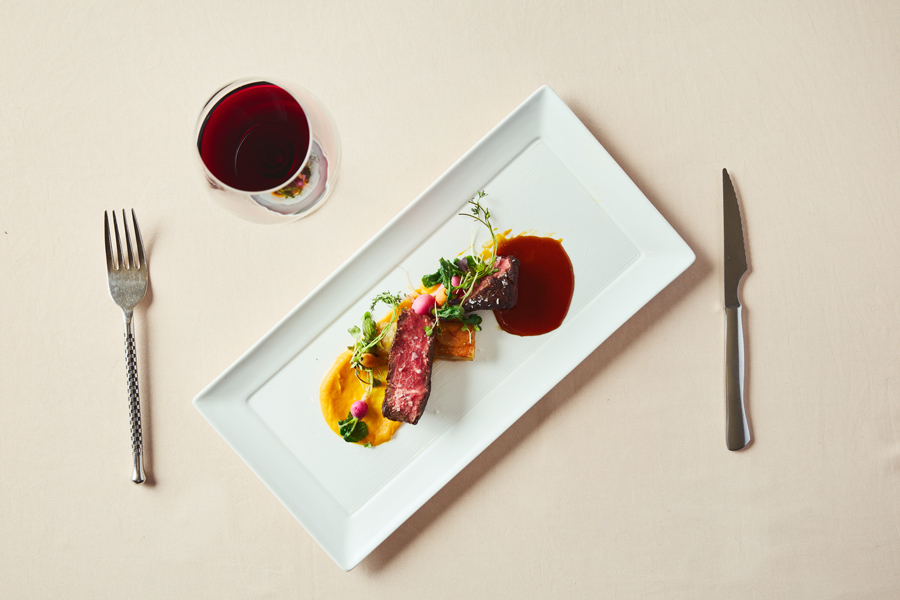 steak entree on rectangle plate