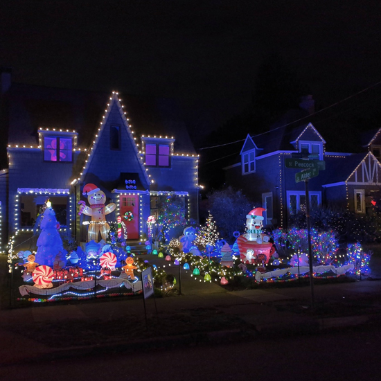 house decorated with holiday lights