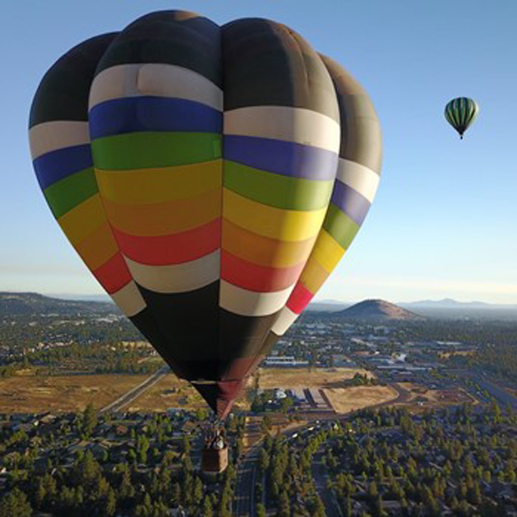 two hot air balloons in the sky