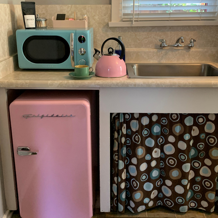 small motel kitchen with retro appliances