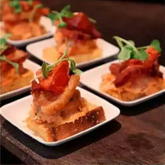 close up of small plates of bruschetta