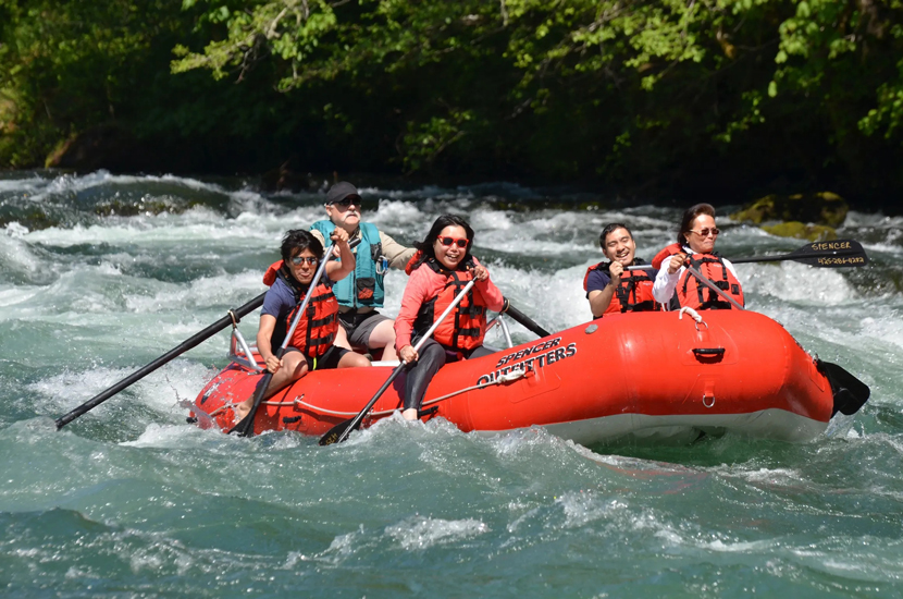 a family white water rafting