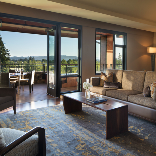 sitting room of hotel suite with patio