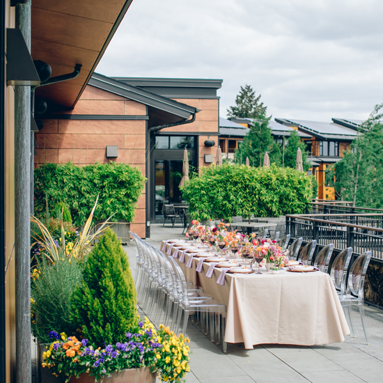 banquet table on patio decorated for wedding