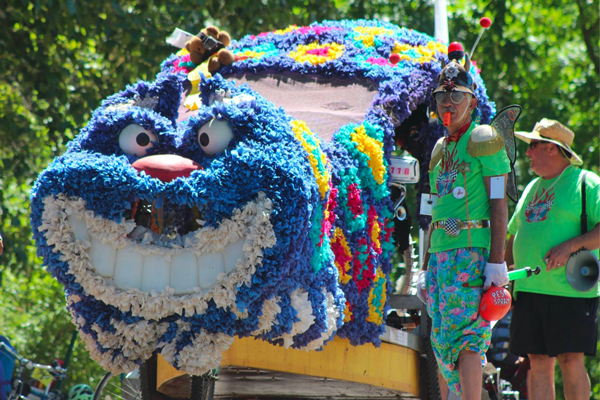 Pedal powered machine decorated as the Cheshire Cat from Alice in Wonderland.