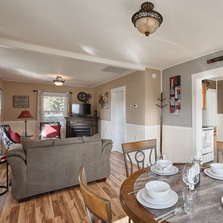 open concept dining room and living room with hardwood floors