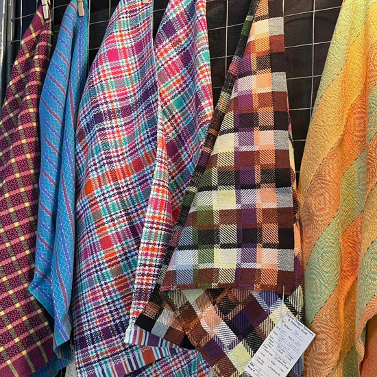 scarves displayed on wall