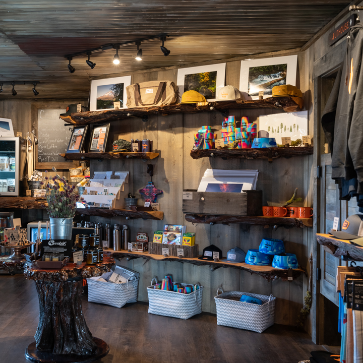 hotel gift shop with rustic shelves and table