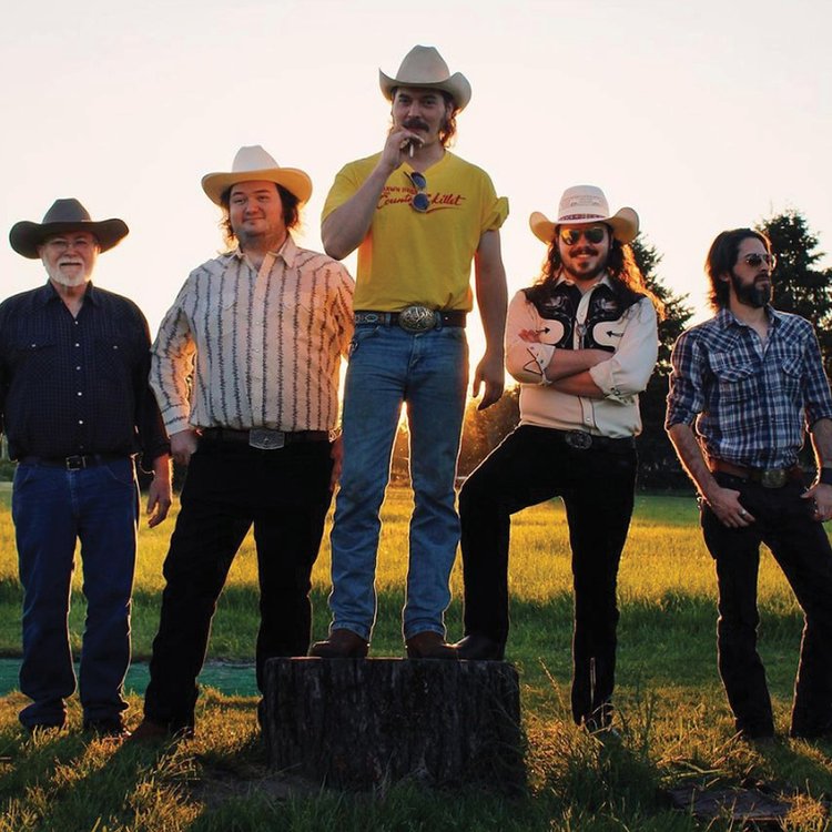 band promo image of five men posing outdoors. four wear cowboy hats