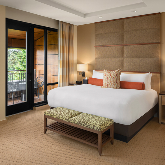 hotel guest room with king sized bed