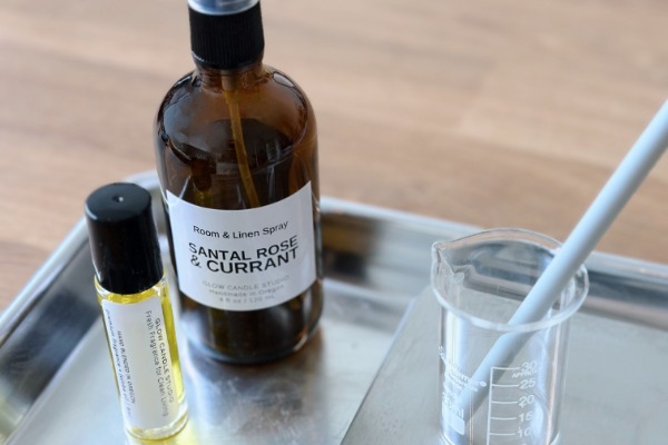Two bottles next to each other on an aluminum tray.