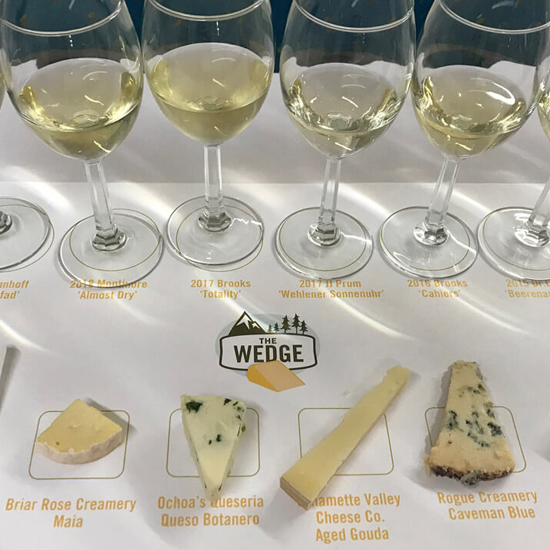 cheese samples with white white pairings displayed on table