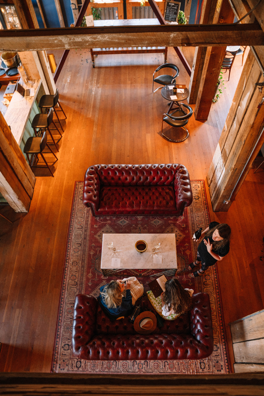two Chesterfield style couches with chic coffee table between them