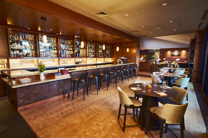bar section of a restaurant with modern decor