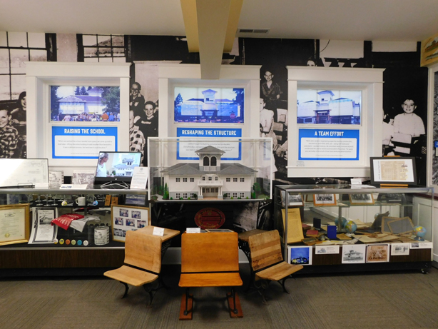 Museum display featuring items from an early 20th century schoolhouse.