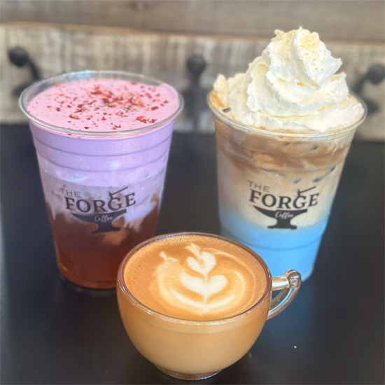 two drinks in plastic to go cups and one espresso beverage in glass mug