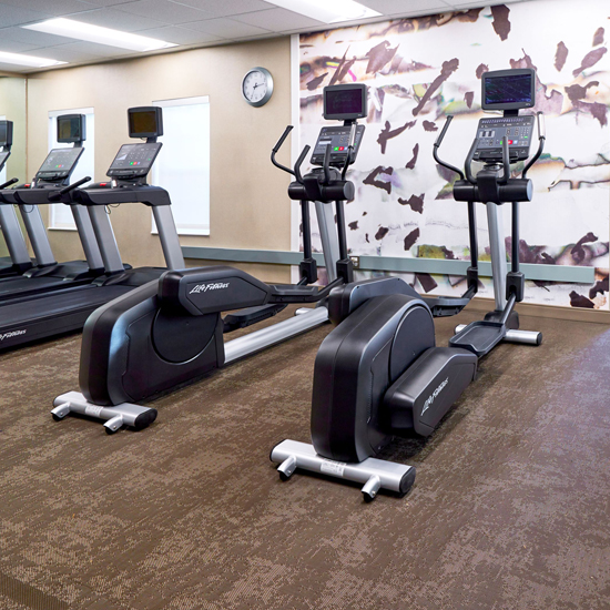 elliptical machines and treadmills in hotel fitness center