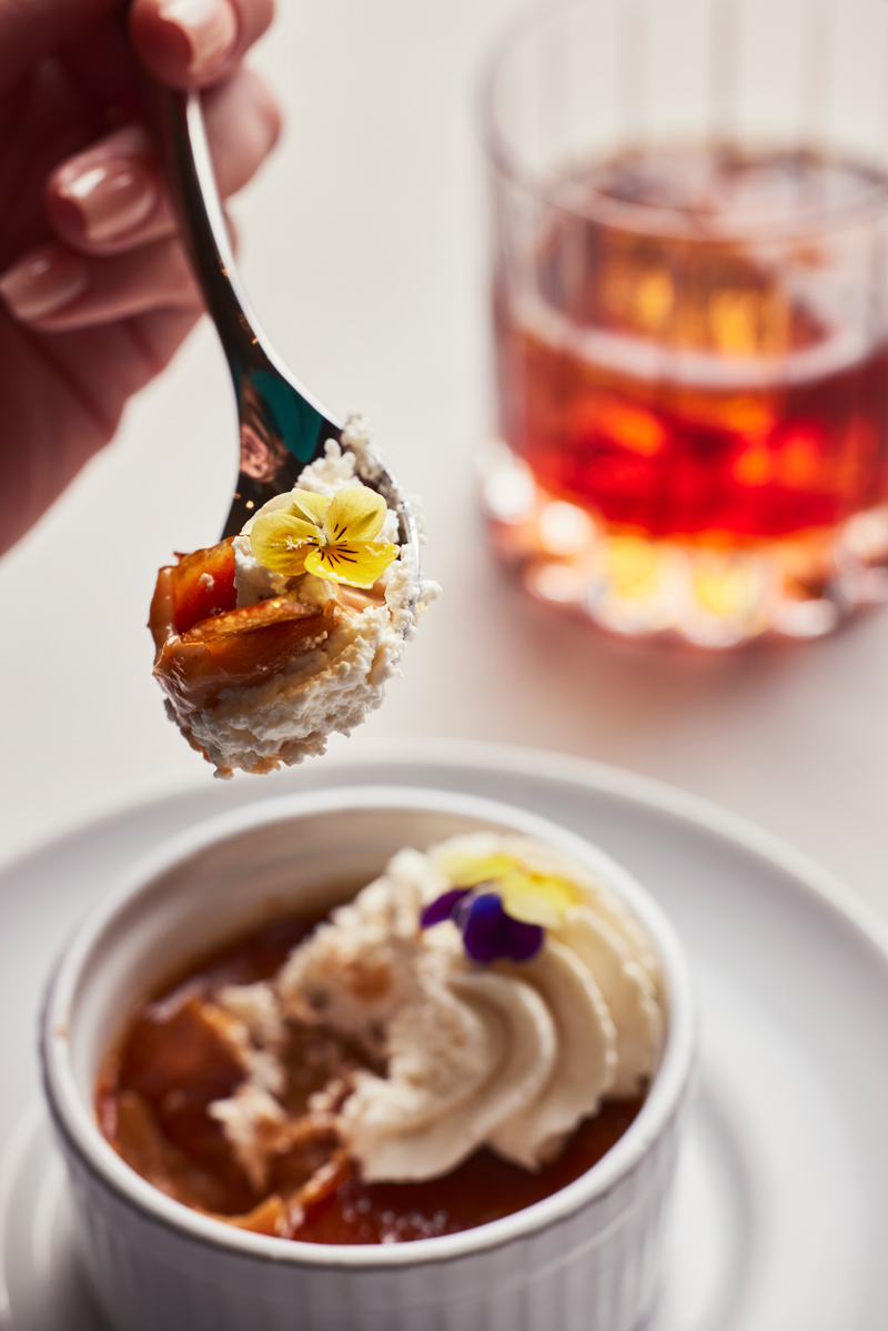 dessert in ramekin with cream