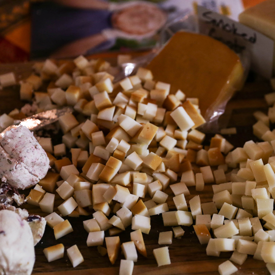 small cubes of cheese on display for sampling
