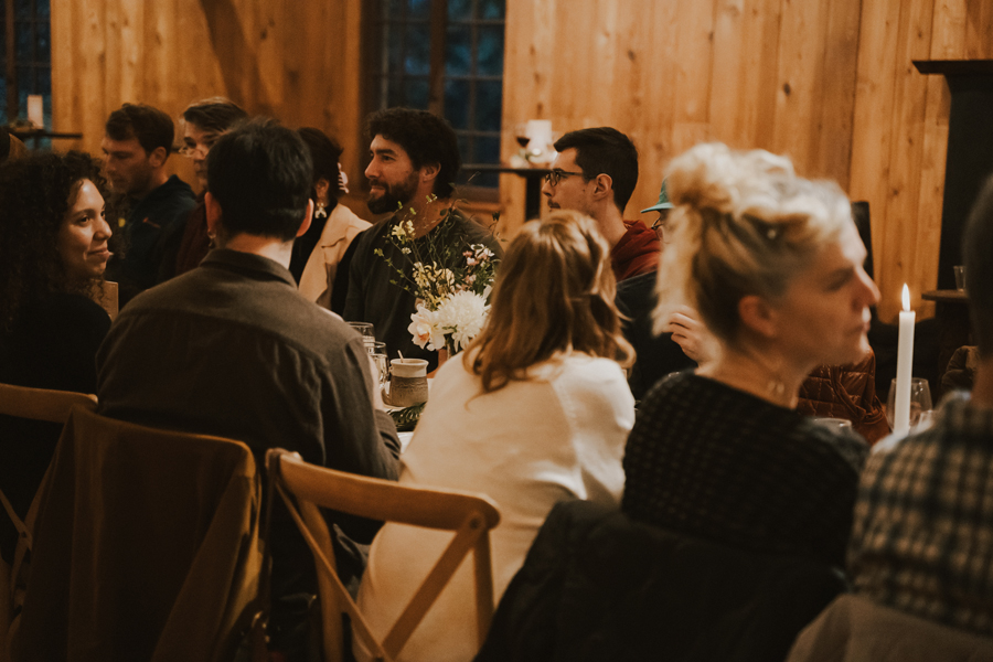 large group seated at a long table for dinner