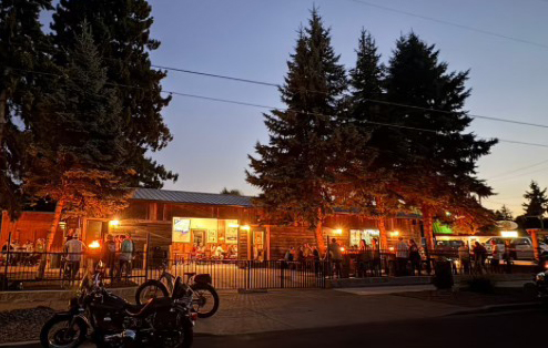 rustic one story brewery at dusk