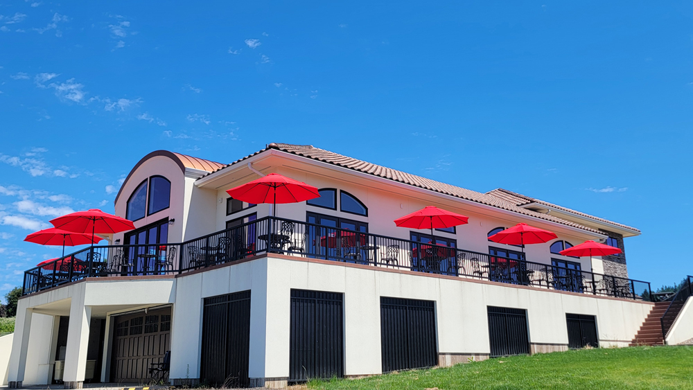 two story winery tasting room with wrap around deck on second story