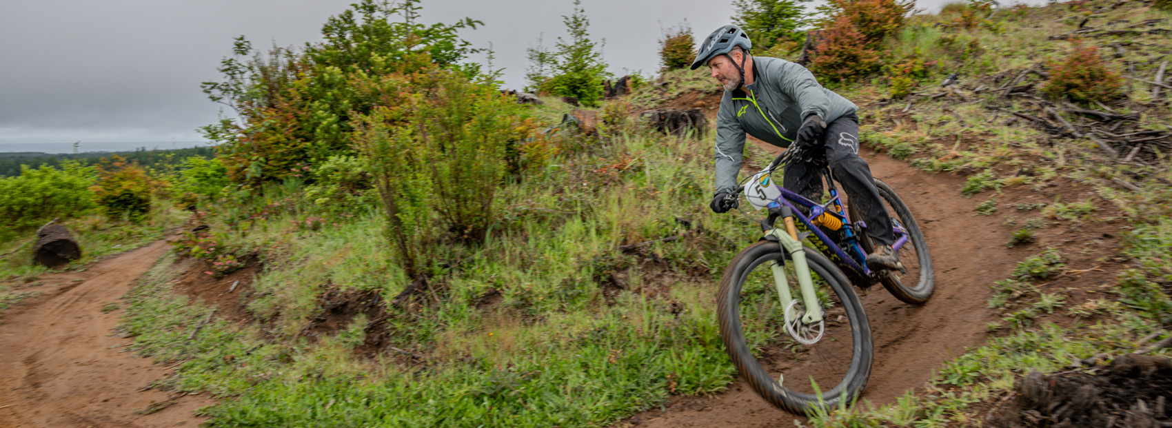 mountain biker coming around a curve