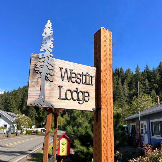 wooden sign with lettering for Westfir Lodge