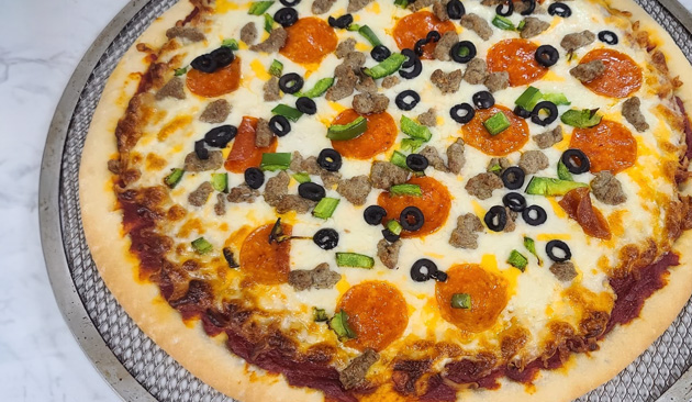 whole pizza on a pan