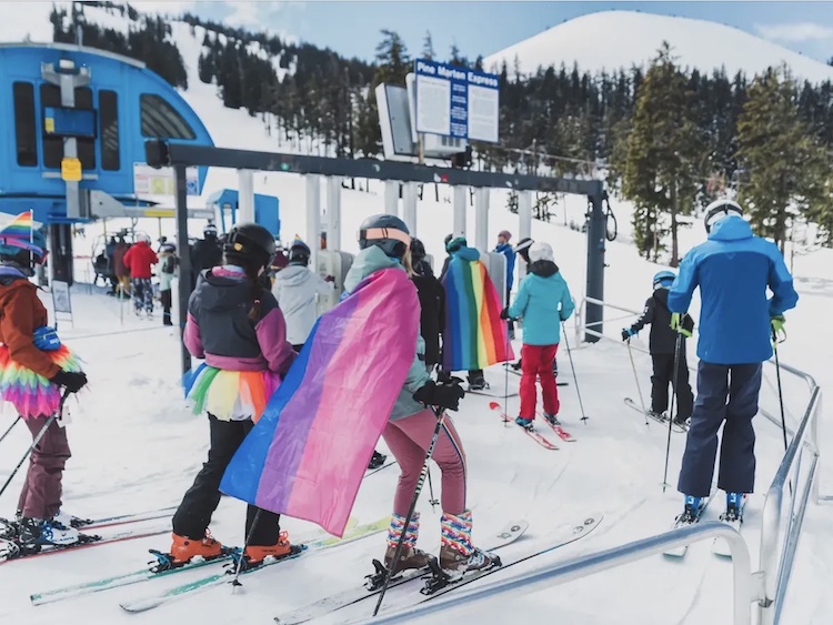 Colorful skiers in the liftline.