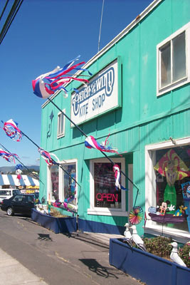 exterior of two story retail building with sign for Catch The Wind Kite Shop