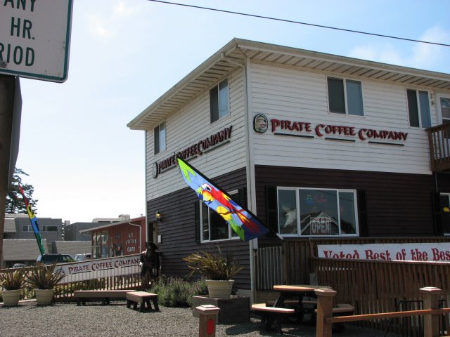 exterior of two story business building with sign for Pirate Coffee Company on two sides