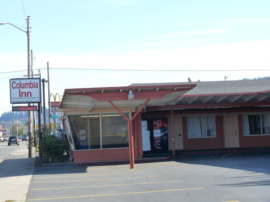 exterior of one story motel with sign for Columbia Inn