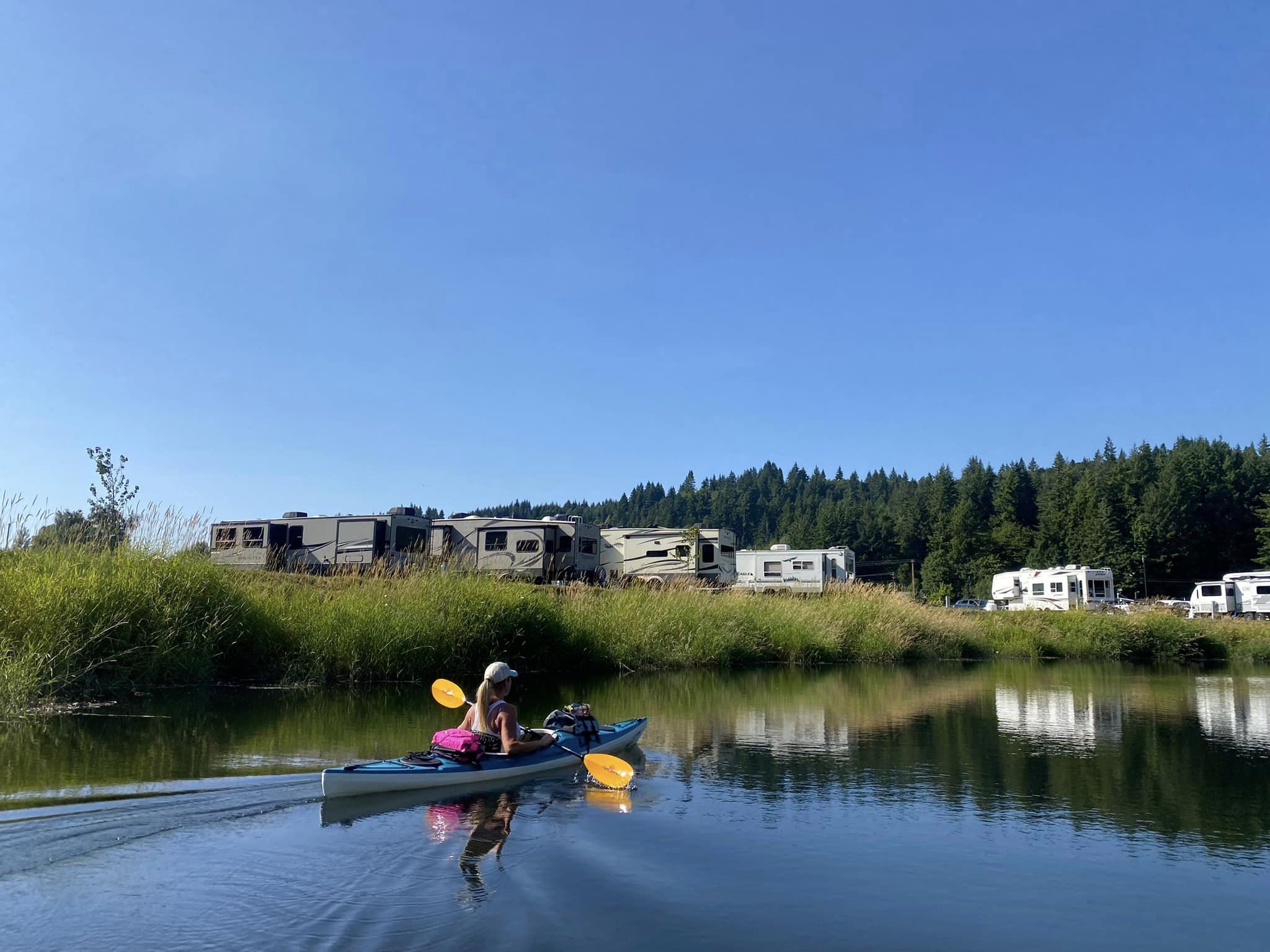 kayaker on lake next to RV Park
