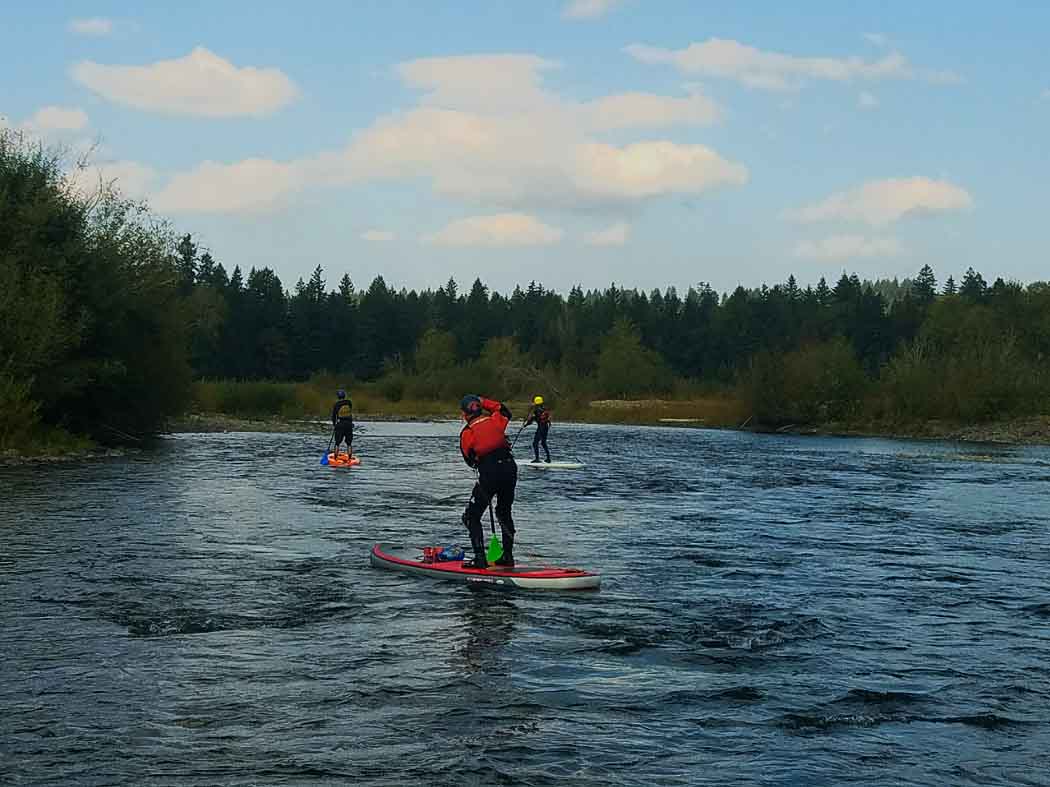 People SUPing in the Clackamas River
