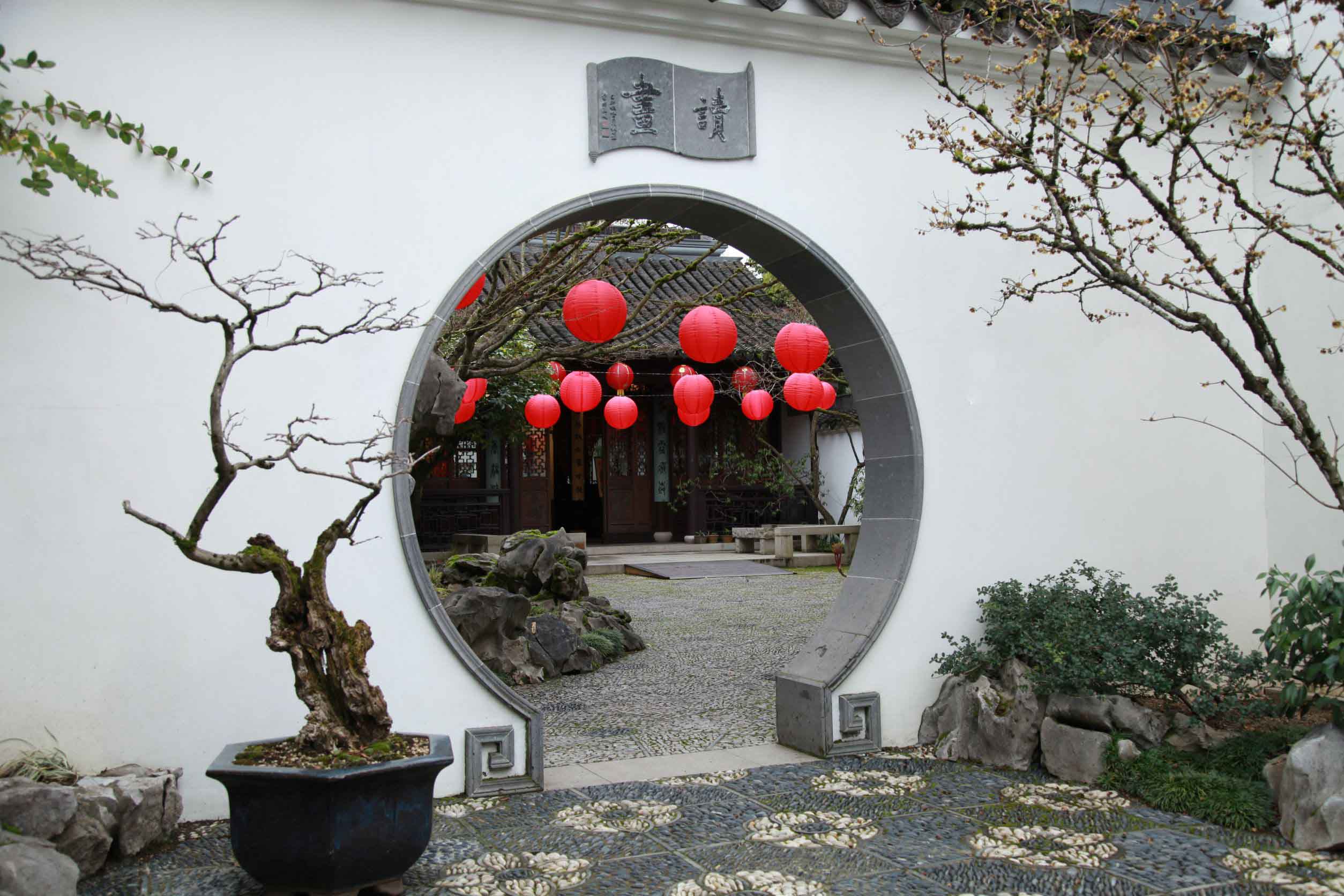 Lanterns hanging over the courtyard entrance