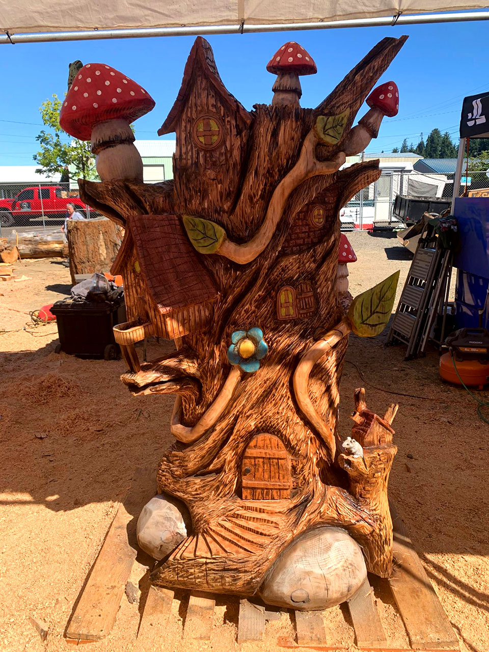 Chainsaw carving of a fairy woodland at the Oregon Divisional Chainsaw Carving Championship in Reedsport, Oregon
