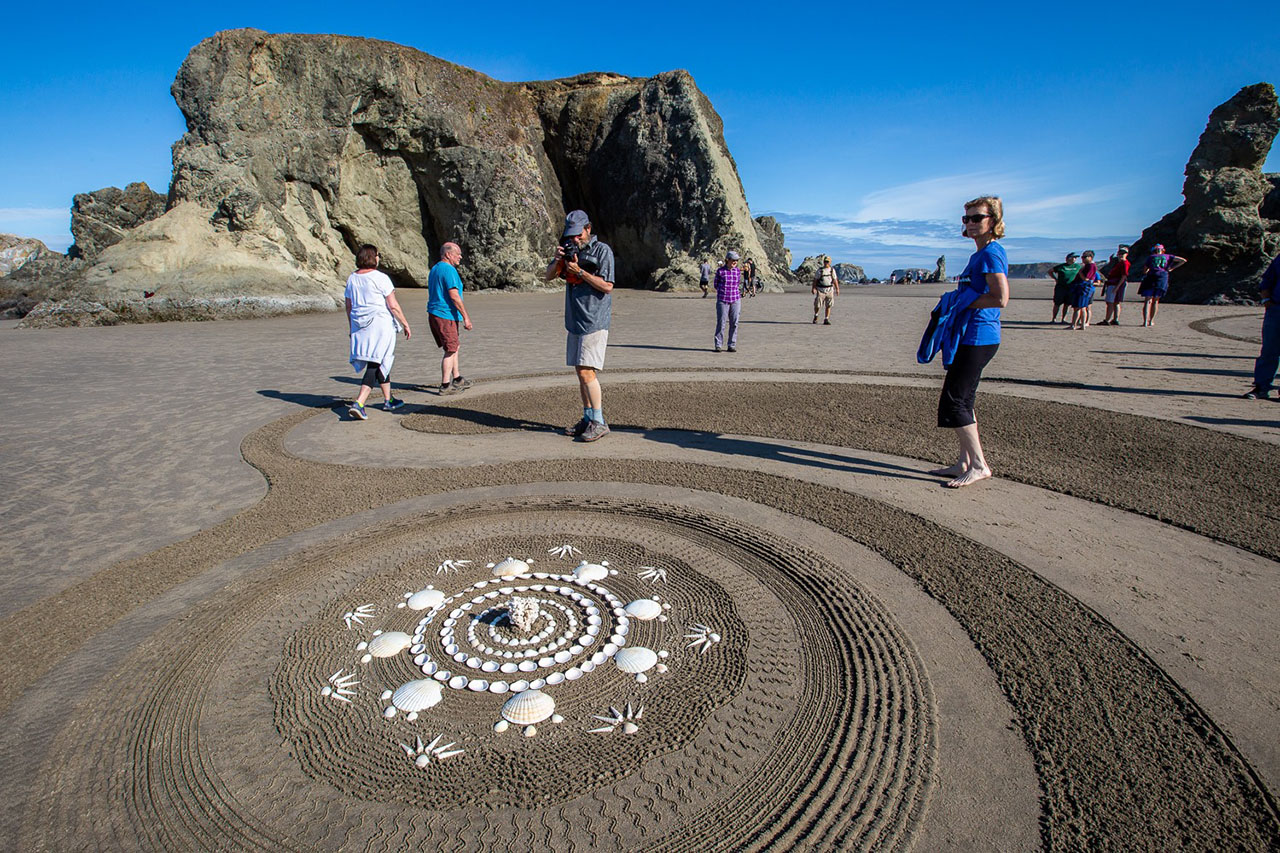 Sand art with shells by Circles in the Sand in Bandon, Oregon