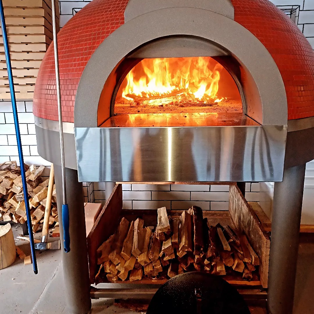 Wood fire pizza oven at Groundlings Pizza Co. in Gold Beach, Oregon